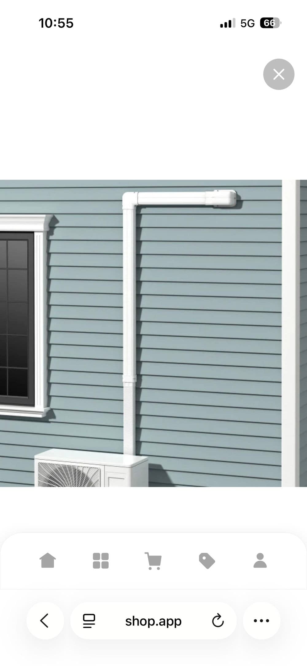 White PVC pipe installation on blue house siding near an air conditioning unit.