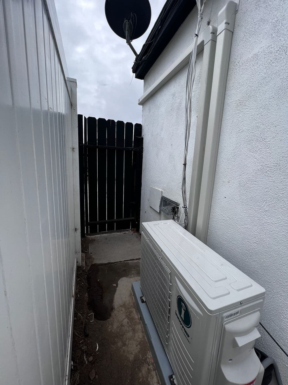 Mini-Split Condenser Install in a Tight Side-Yard Space in La Jolla CA image